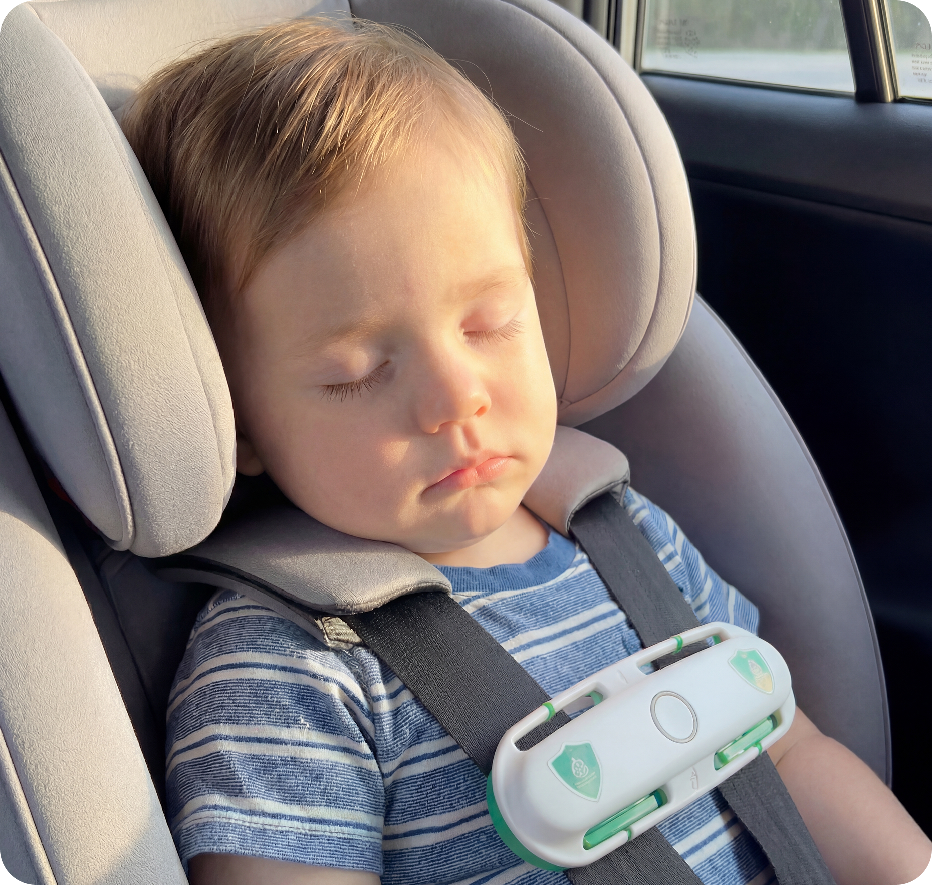 Baby safely secured in car seat